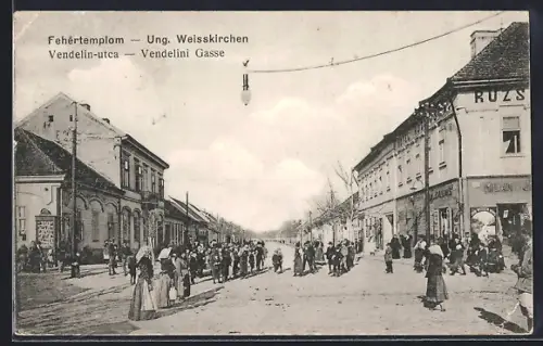 AK Ung. Weisskirchen, Vendelini Gasse mit Geschäften, Strassenpartie