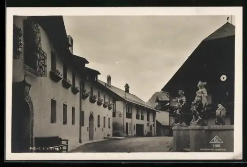 AK Pichl / Enns, Ortspartie am Brunnen