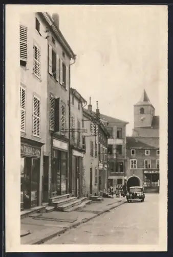 AK Bouzonville, Rue de la République avec voitures et commerces