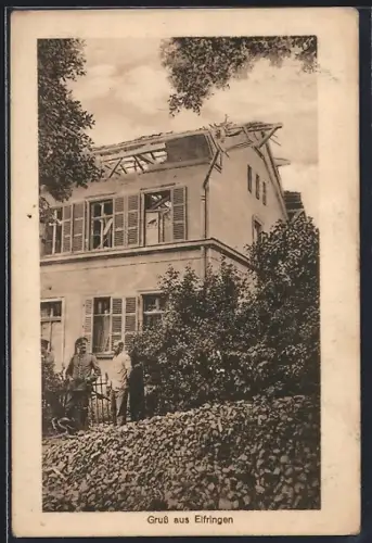 AK Elfringen, Maison endommagée avec deux personnes devant