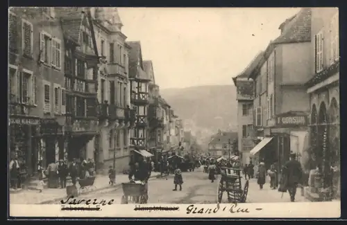 AK Saverne, Grand`Rue animée avec passants et boutiques