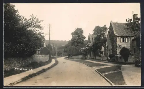 AK Broadway, Street view with houses and telephone poles