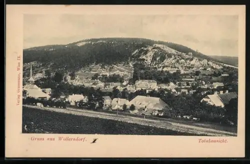 AK Wöllersdorf, Totalansicht mit Bergkulisse
