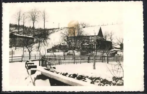 Foto-AK Hettstedt / Südharz, Fachwerkhaus im Winter