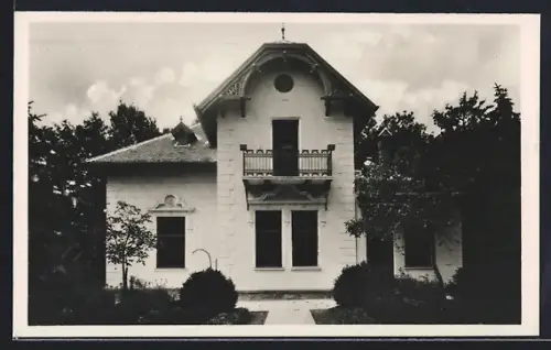 AK Pilicsaba, Blick auf ein Haus