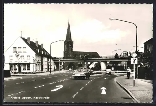 AK Krefeld-Oppum, Hauptstrasse mit Blick auf die Kirche