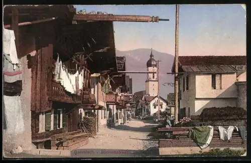 AK Garmisch, Partie in der Sonnenstrasse mit Blick auf die Kirche