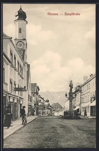 AK Murnau / Staffelsee, Hauptstrasse mit Geschäften und Denkmal