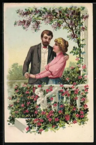 AK Liebespaar in einer Parkanlage mit Blumen