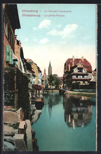 AK Strasbourg, La petite France avec vue sur le canal et la cathédrale au fond