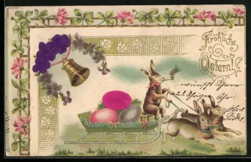 AK Osterhase auf einem Schlitten, Blumen und Osterei aus echtem Stoff