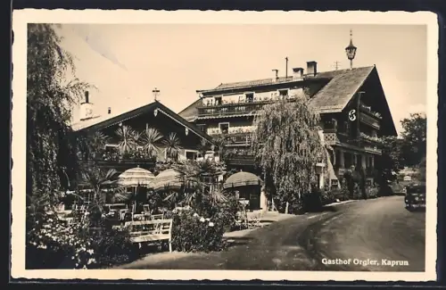 AK Kaprun, Gasthaus Orgler mit  Flagge