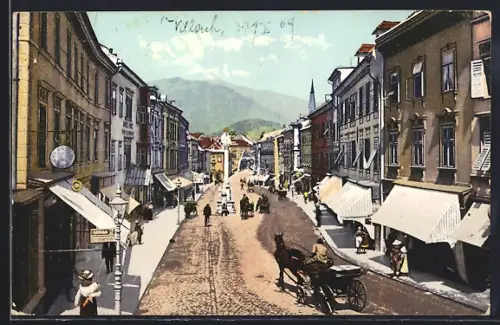 AK Villach, Hauptplatz mit Denkmal und Pferdewägen