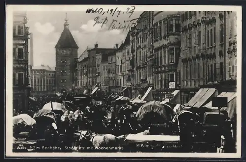 AK Wels, Stadtplatz mit Geschäften und Wochenmarkt