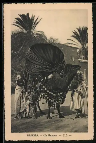 AK Biskra, Un Basour, Araber mit Kamel