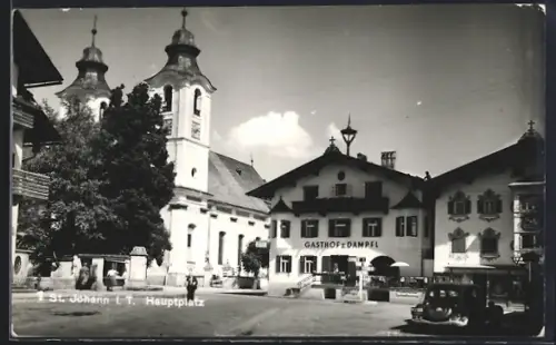 AK St. Johann i. T., Gasthof zum Dampfl und Kirche am Hauptplatz