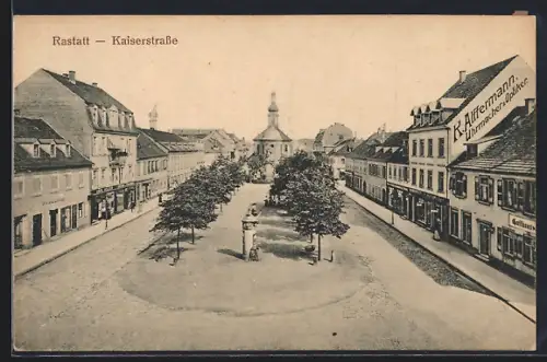 AK Rastatt, Kaiserstrasse mit Geschäften und Kirchturm