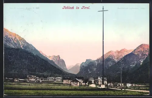 AK Toblach in Tirol, Ortspartie mit Bergen