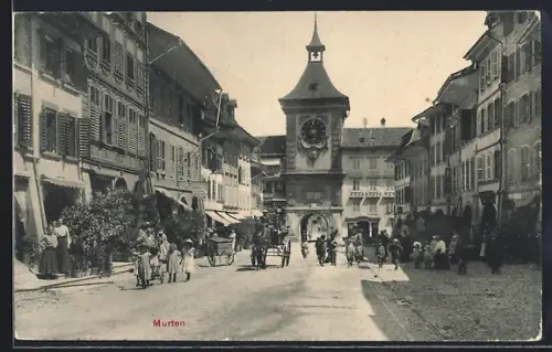 AK Murten, Blick auf Häuserfassaden und Turm mit Toreinfahrt