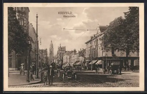 AK Crefeld, Rheinstrasse mit Blick auf Kirche, Geschäftsfassaden