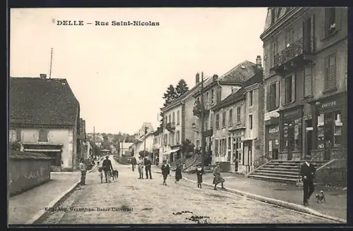 AK Delle, Rue Saint-Nicolas avec passants et facades de boutiques