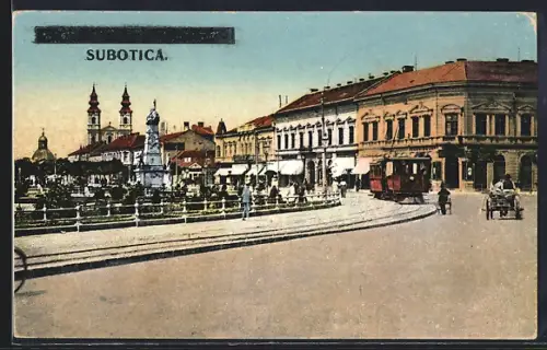 AK Subotica, Strassenpartie mit Kirche und Strassenbahn