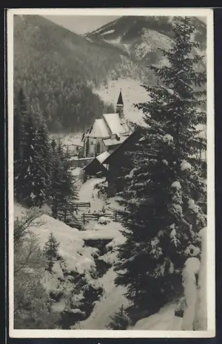 AK Seewiesen, Ortsansicht mit Kirche im Schnee