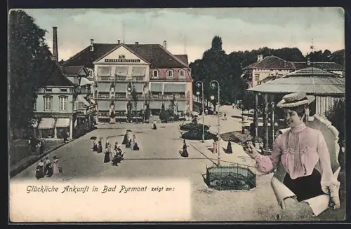 AK Bad Pyrmont, Ortspartie mit Häusern, Spaziergängern und Rondell