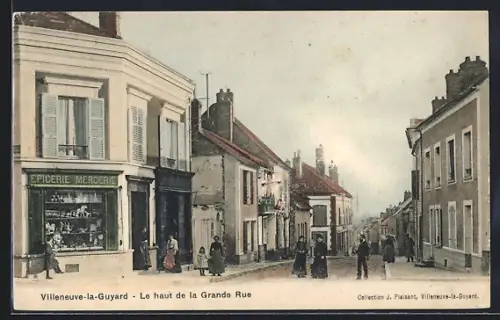 AK Villeneuve-la-Guyard, Le haut de la Grande Rue avec épicerie et passants