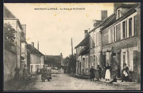 AK Montigny-la-Resle, La Route de St-Florentin avec habitants et maisons en briques