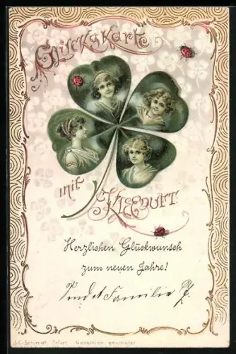 Duft-AK Gesichter blicken aus einem Kleeblatt heraus