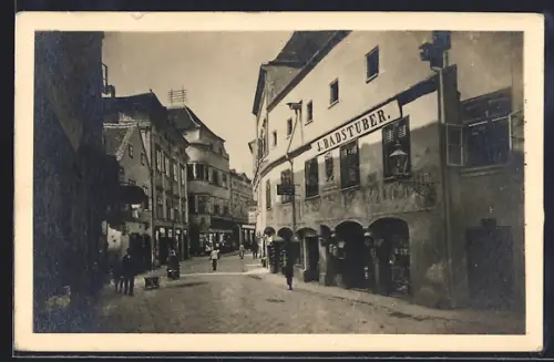 AK Krems /Wachau, Landstrasse mit Geschäft von J. Badstuber