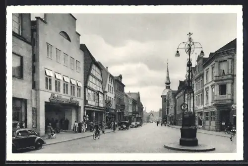 AK Oldenburg /Oldb., Lange Strasse mit Kirche, VW-Käfer