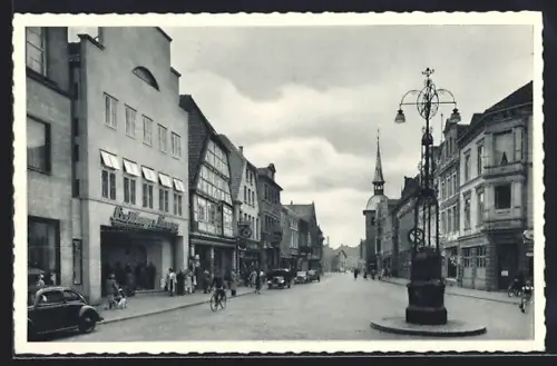 AK Oldenburg /Oldb., Lange Strasse mit Kirche, VW-Käfer