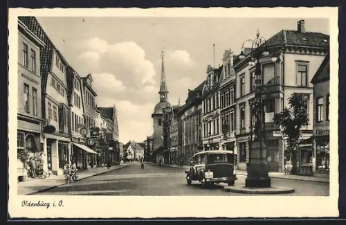 AK AK Oldenburg / O., Heilig-Geiststrasse mit Autos und Geschäften
