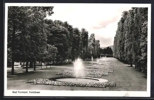 AK Bad Pyrmont, Wasserfontänen im Park