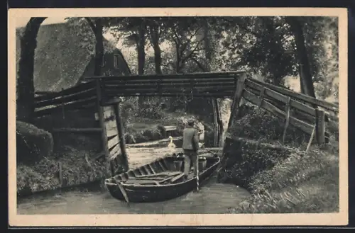 AK Giethoorn, Kahnpartie unter einer Brücke, mit Reetdach-Haus