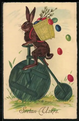 Künstler-AK Osterhase auf dem Hochrad mit einem Korb voll Ostereier auf dem Rücken, Sretan Uskrs