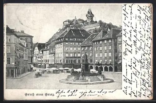 AK Graz, Platz mit Denkmal, Markt u. Uhrenturm
