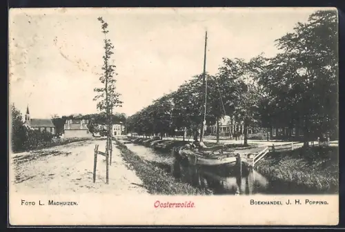 AK Oosterwolde, Flusspartie mit Schiff