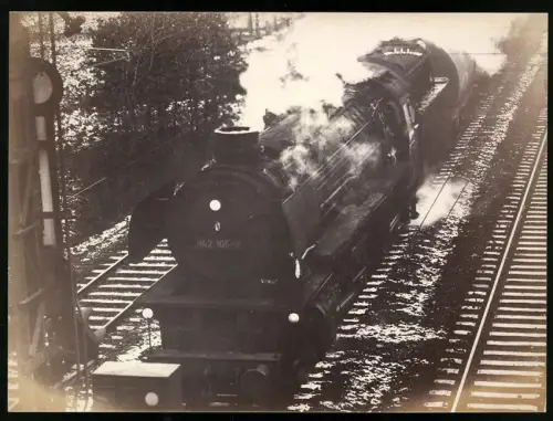 Fotografie Eisenbahn Deutsche Reichsbahn, Dampflok - Lokomotive No. 042 105-7, Güterzug mit Tankwaggons in Fahrt