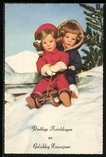 AK Käthe Kruse-Puppe, Schneelandschaft mit Junge und Mädchen auf einem Schlitten