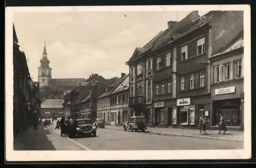 AK Mimon, Strassenansicht mit Geschäften