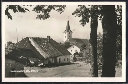 AK Hellmonsödt /Ob.-Donau, Ortspartie mit Kirche