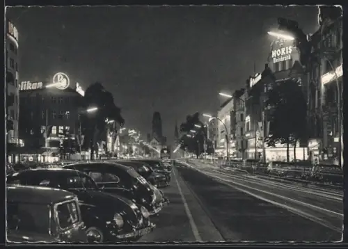 AK Berlin-Charlottenburg, Kurfürstendamm bei Nacht, Autos, Kaiser-Wilhelm-Gedächtniskirche