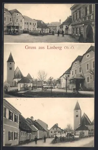 AK Lasberg /Ob.-Ö., Strassenpartie mit Kirche, Denkmal