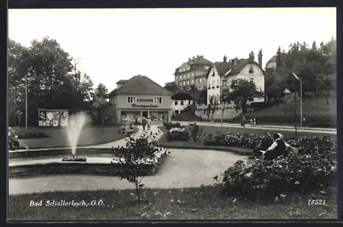 AK Bad Schallerbach, Brunnen am Kaufhaus Baumgartner