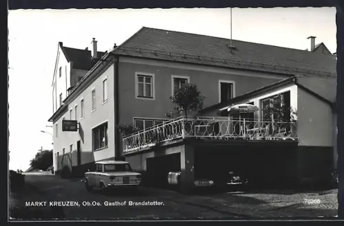 AK Markt Kreuzen /Ob. Oe., Strassenpartie am Gasthof Brandstetter