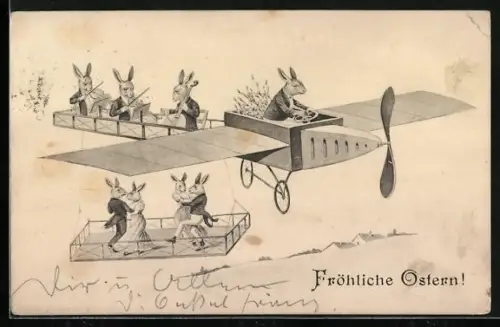 AK Musizierende und tanzende Osterhasen in einem Flugzeug
