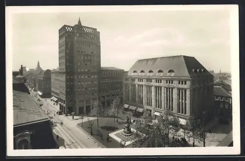 AK Düsseldorf, Strassenpartie mit Wilhelm Marx-Haus und Geschäftshaus Carsch